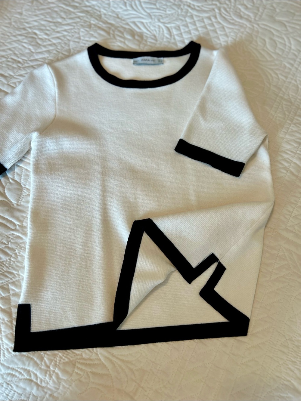 Classic Ivory Knit Top with Black Trim. A very nice weighted knit fabric.